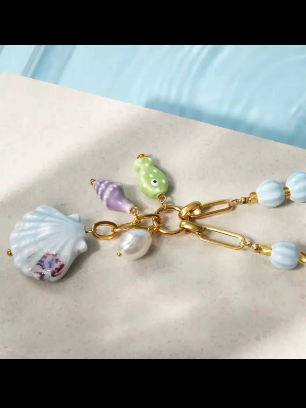 Anthropologie gold cluster shell